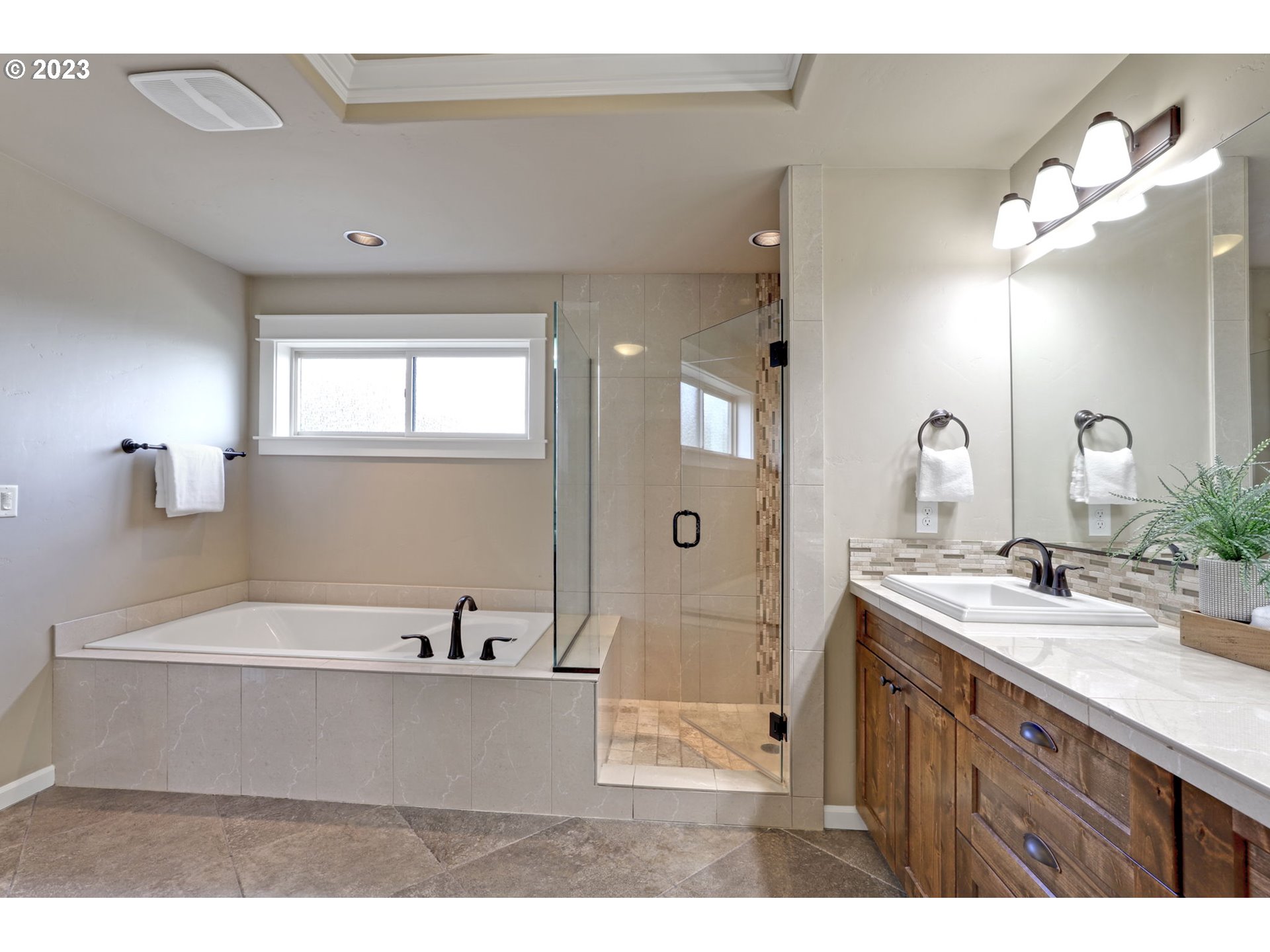 9806 Northwest Wayne Lane Portland, OR 97229 - Photo 14 of 21 a bathroom with a sink mirror and vanity