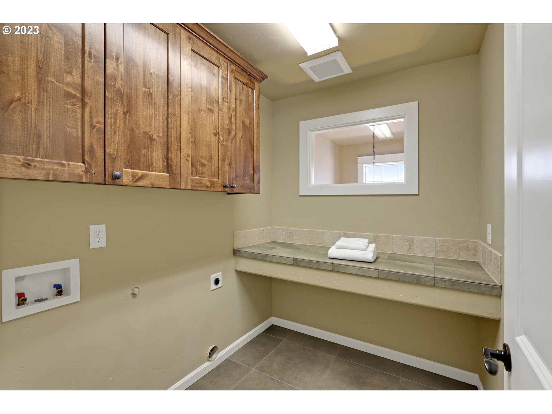 9806 Northwest Wayne Lane Portland, OR 97229 - Photo 17 of 21 a bathroom with a sink and a mirror