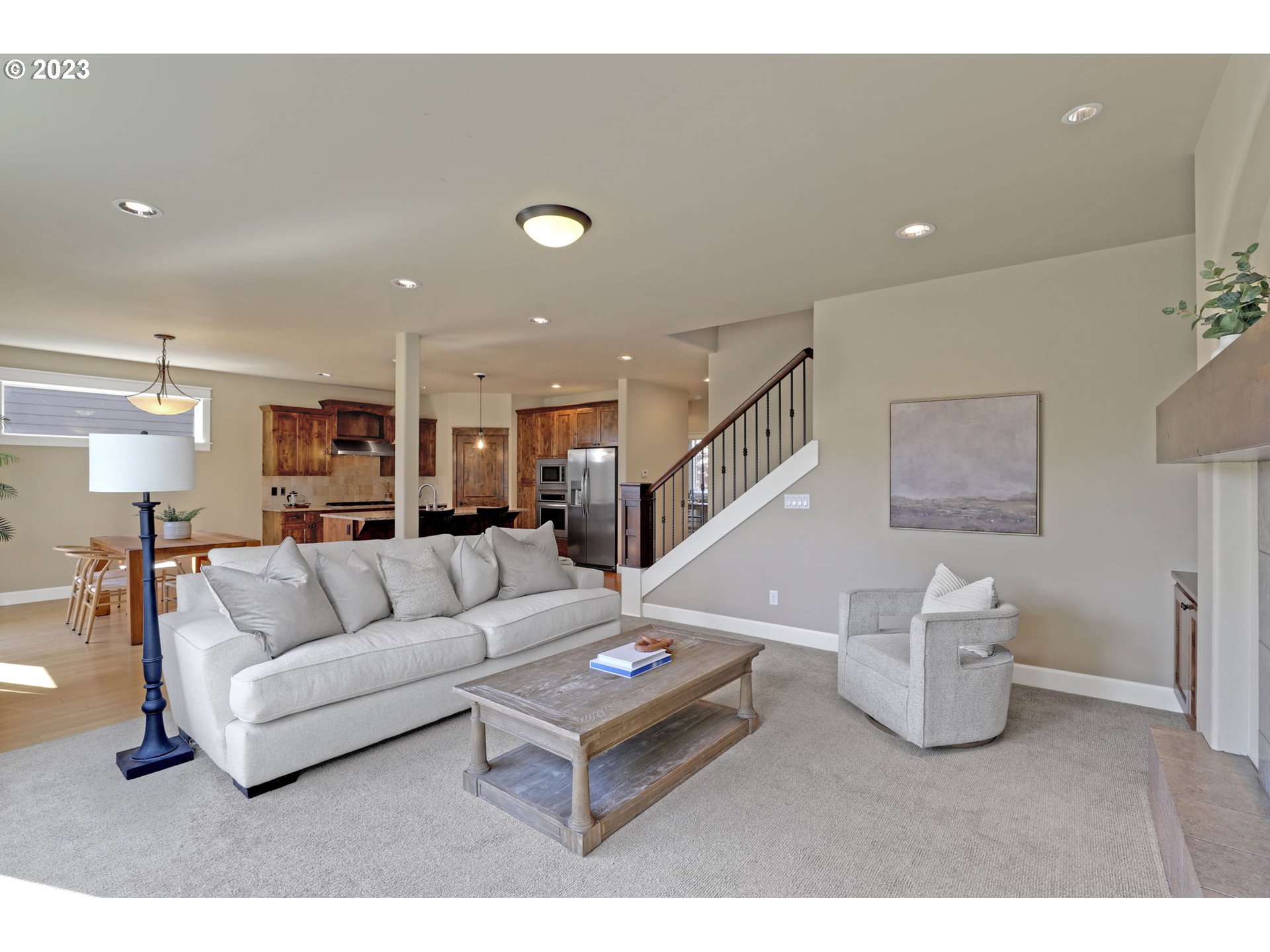 9806 Northwest Wayne Lane Portland, OR 97229 - Photo 4 of 21 a living room with furniture and a wooden floor