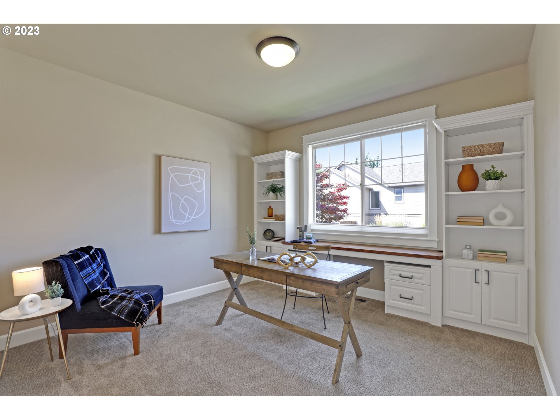 9806 Northwest Wayne Lane Portland, OR 97229 - Photo 8 of 21 a living room with furniture and a window