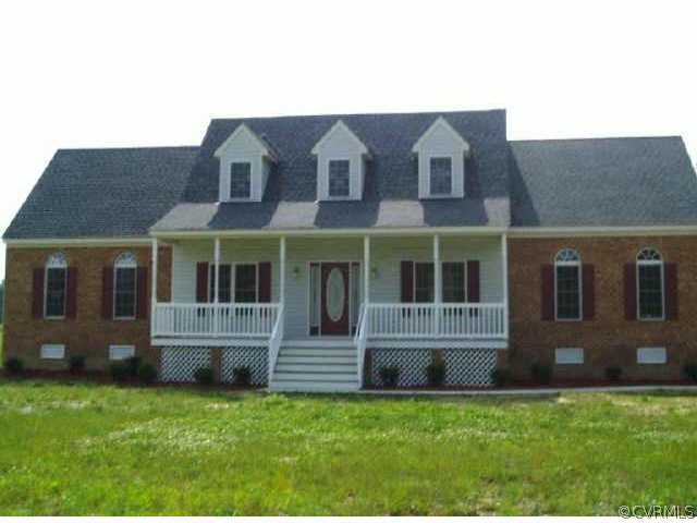 8000 Hines Road Disputanta, VA 23842 - Photo 1 of 2 a view of a house with a yard