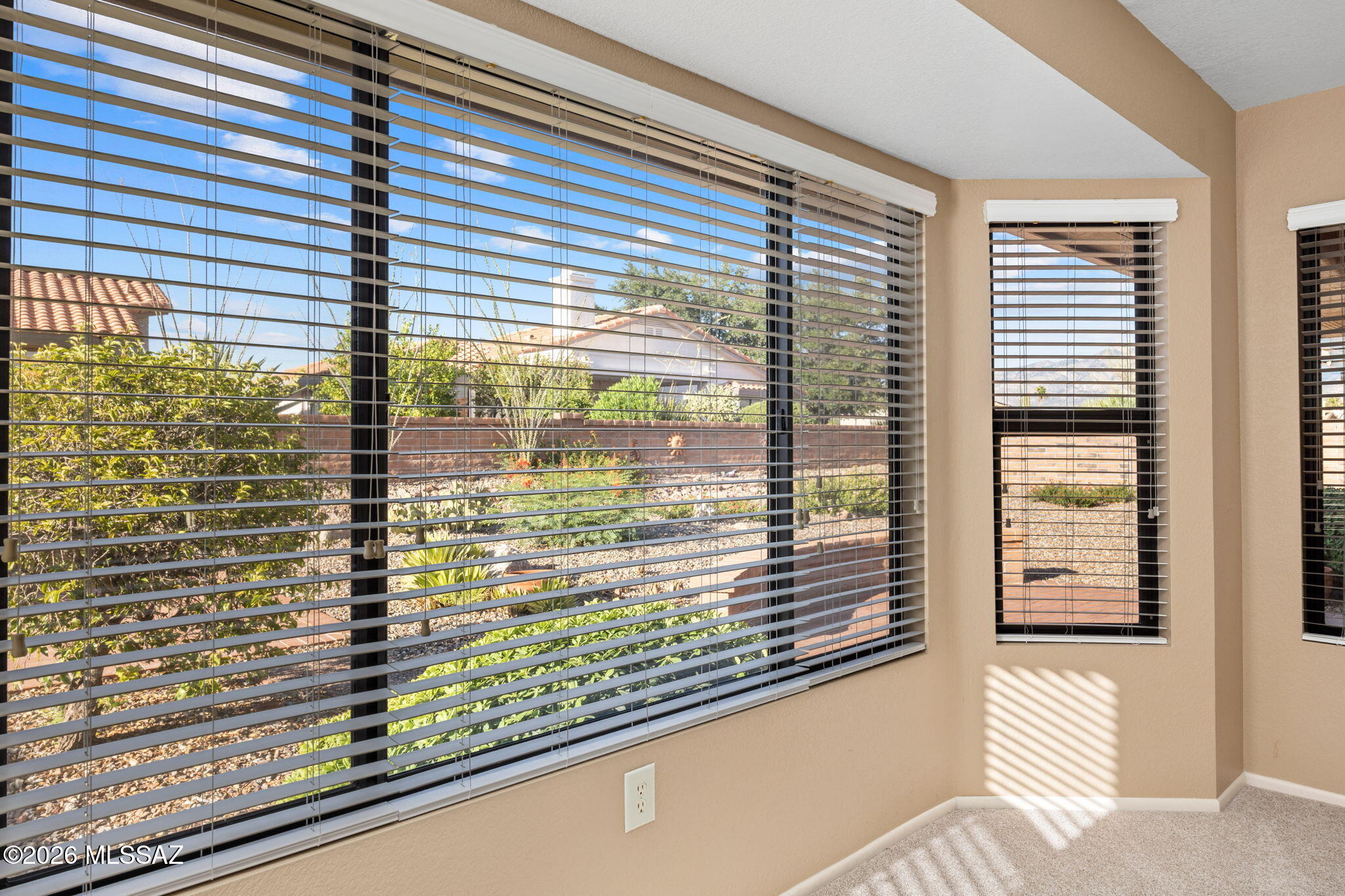 1029 East Rising Sun Drive Oro Valley, AZ 85755 - Photo 17 of 51 KITCHEN BAY WINDOW VIEW