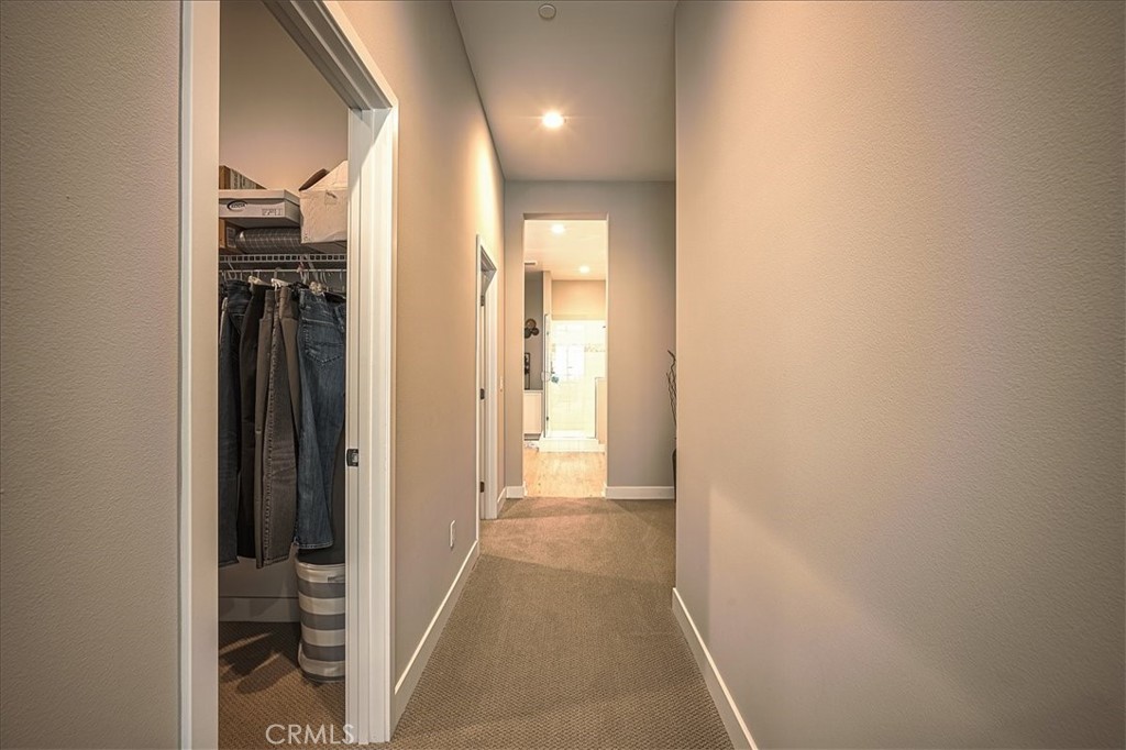 13471 Planet Court Riverside, CA 92503 - Photo 18 of 51 a view of a hallway with wooden floor and staircase