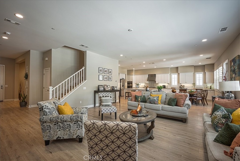 13471 Planet Court Riverside, CA 92503 - Photo 23 of 51 a living room with furniture and wooden floor
