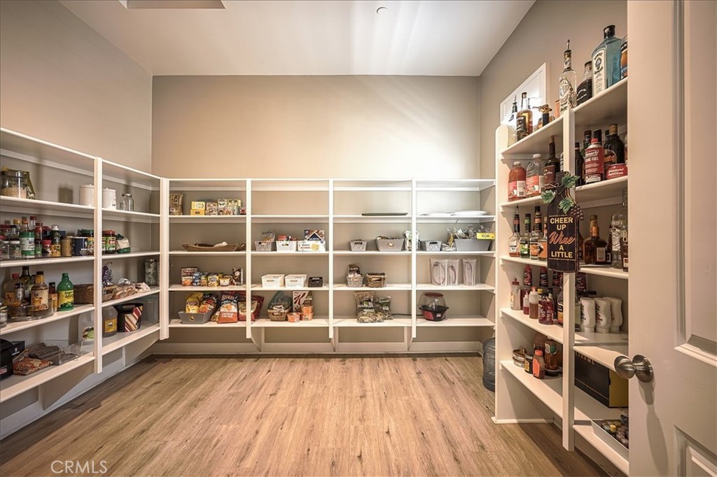 13471 Planet Court Riverside, CA 92503 - Photo 29 of 51 a view of a room with shelves on the wall