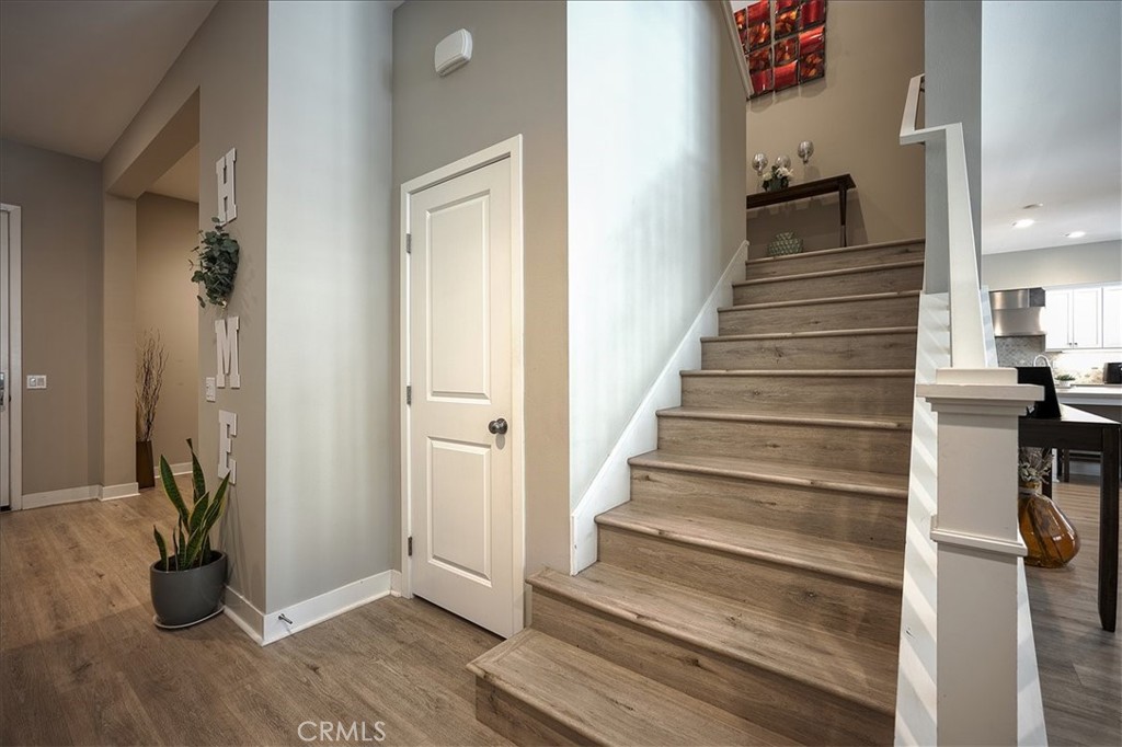 13471 Planet Court Riverside, CA 92503 - Photo 32 of 51 a view of an entryway with wooden floor and a livingroom view