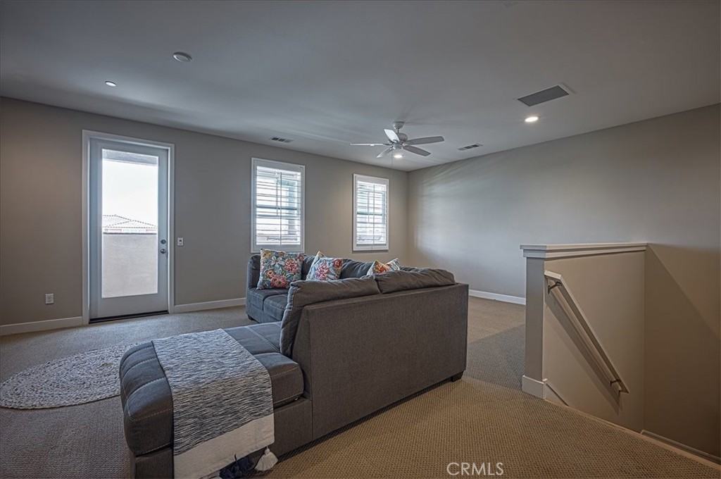 13471 Planet Court Riverside, CA 92503 - Photo 33 of 51 a living room with furniture and a window