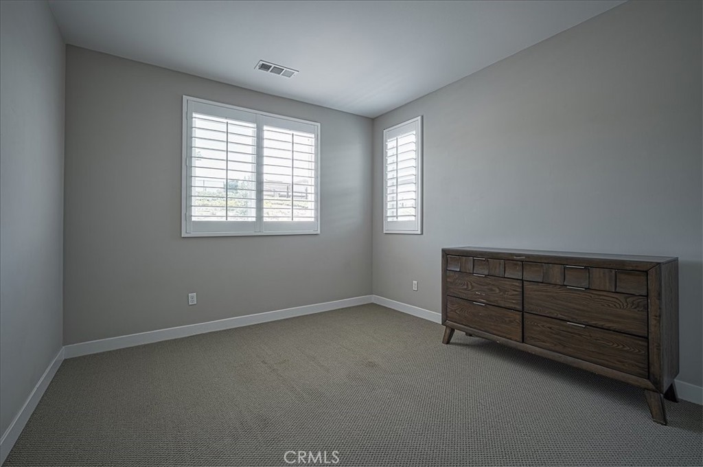 13471 Planet Court Riverside, CA 92503 - Photo 39 of 51 an empty room with windows