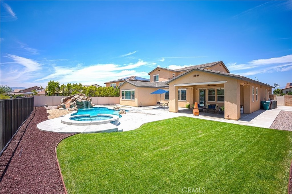 13471 Planet Court Riverside, CA 92503 - Photo 45 of 51 a front view of a house with garden