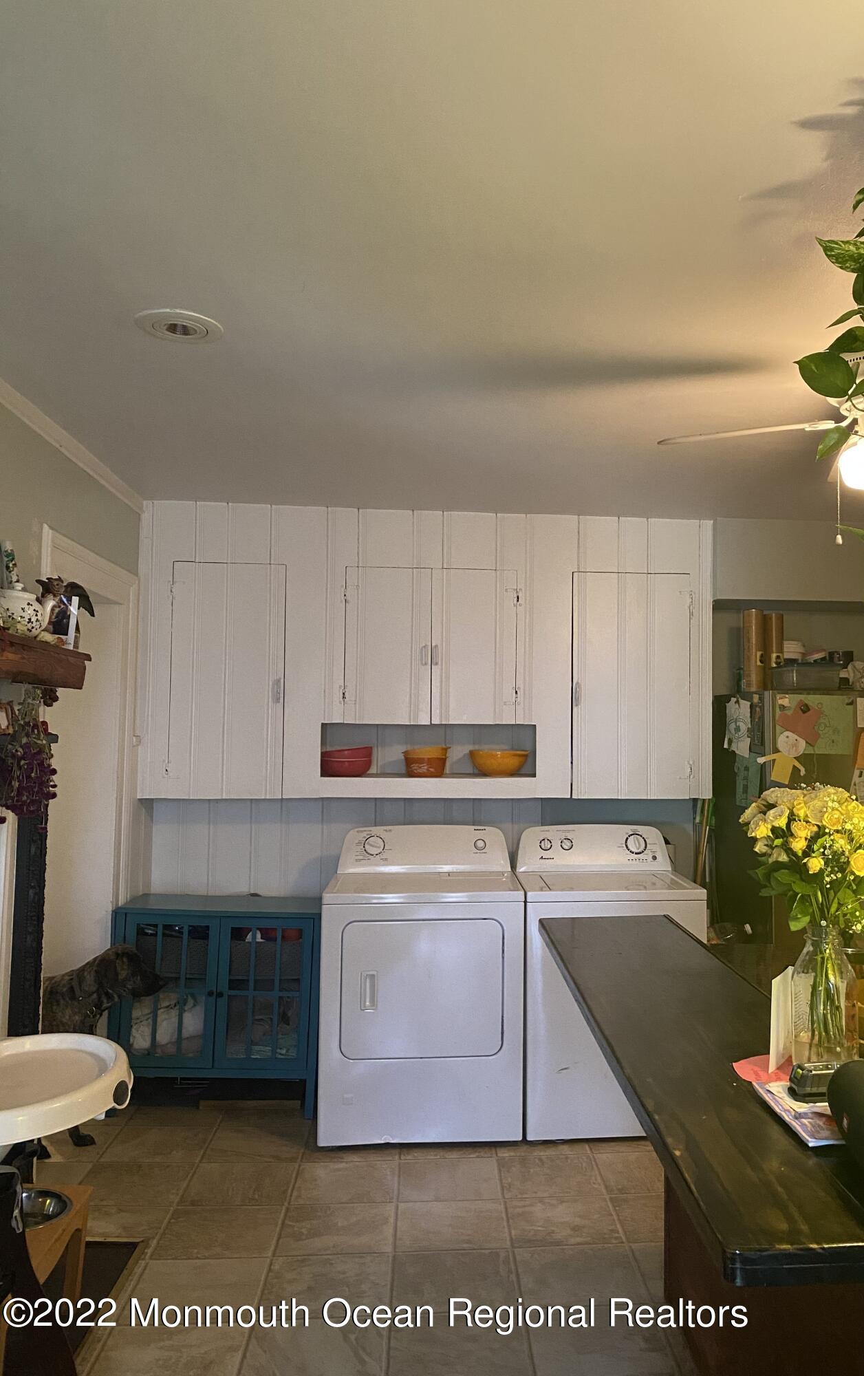 1737 Belmar Boulevard, Unit A Belmar, NJ 07719 - Photo 11 of 15 a kitchen with stainless steel appliances granite countertop a stove a sink and a white cabinets