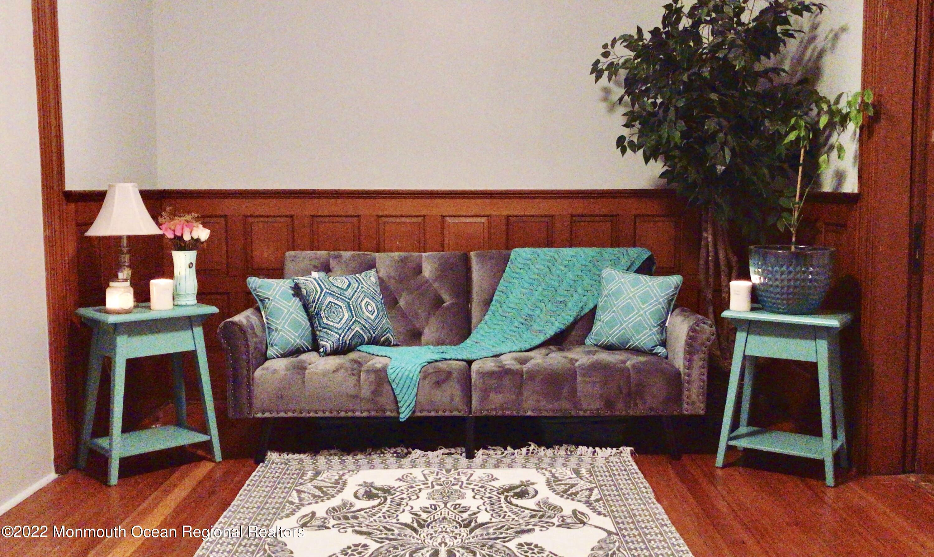 1737 Belmar Boulevard, Unit A Belmar, NJ 07719 - Photo 5 of 15 a living room with furniture and a rug