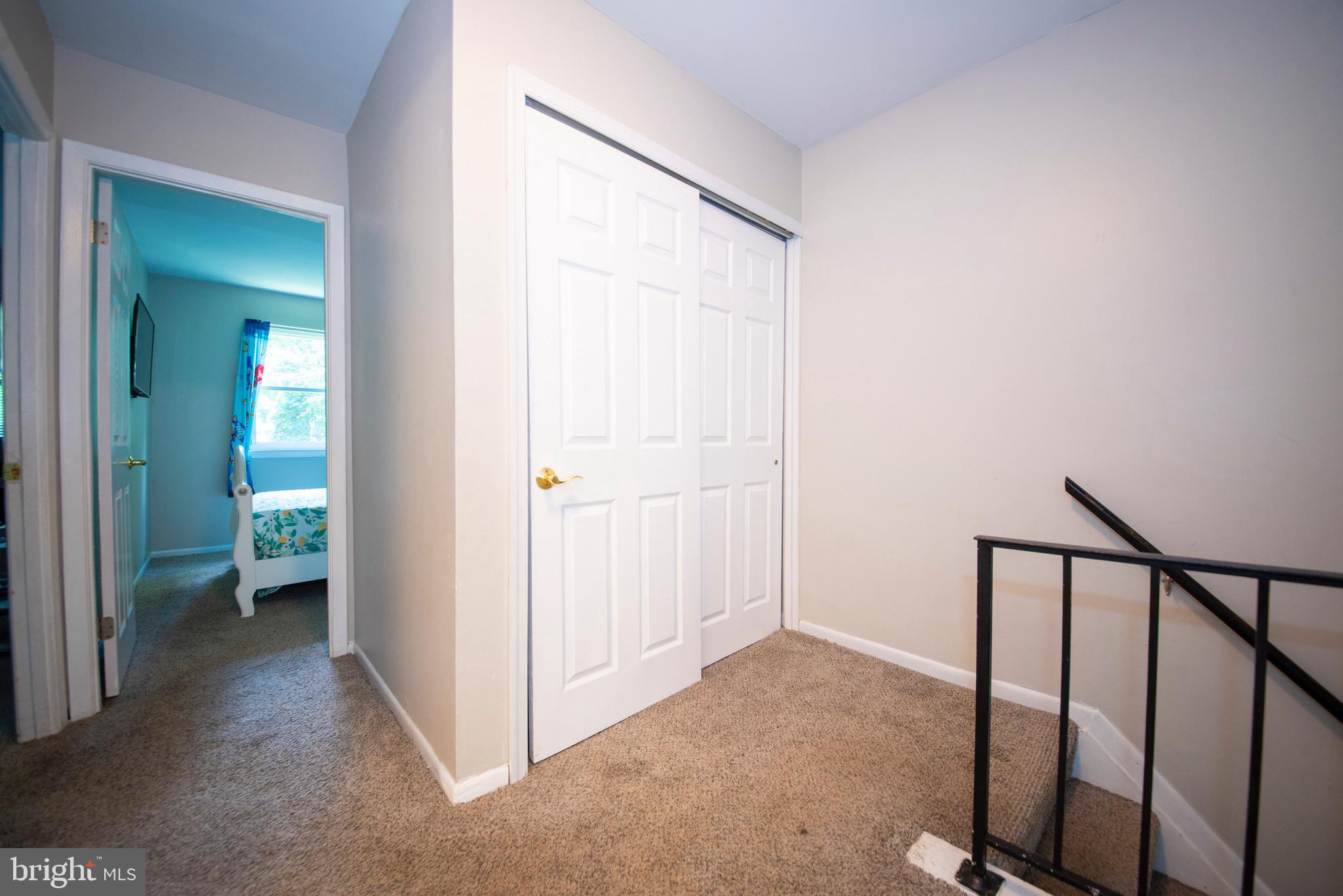 9355 Pan Ridge Road, Unit 9355 Parkville, MD 21234 - Photo 14 of 32 a view of a room with a hallway