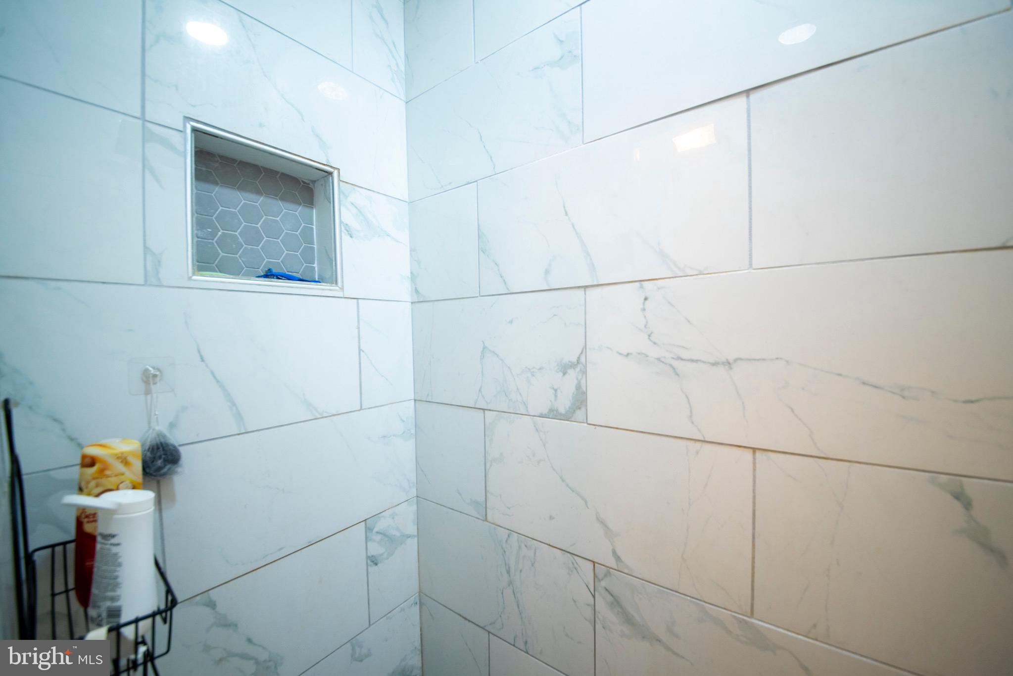 9355 Pan Ridge Road, Unit 9355 Parkville, MD 21234 - Photo 22 of 32 a bathroom with a shower