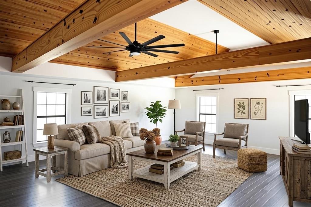 10575 Friendship Road Pilot Point, TX 76258 - Photo 5 of 32 Living area featuring a vaulted wood-finish ceiling with exposed beams, dark wood-finish flooring, white walls, and multiple windows
