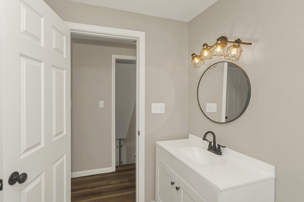 374 Rondeau Street Palmer, MA 01069 - Photo 20 of 27 a bathroom with a sink and a mirror