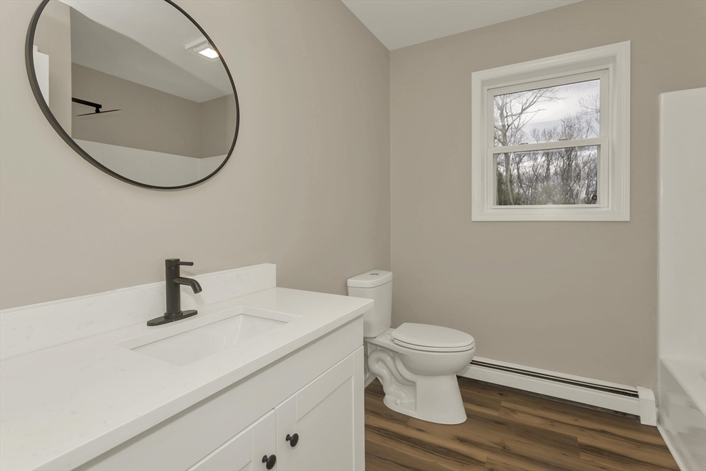 374 Rondeau Street Palmer, MA 01069 - Photo 9 of 27 a bathroom with a sink and a mirror