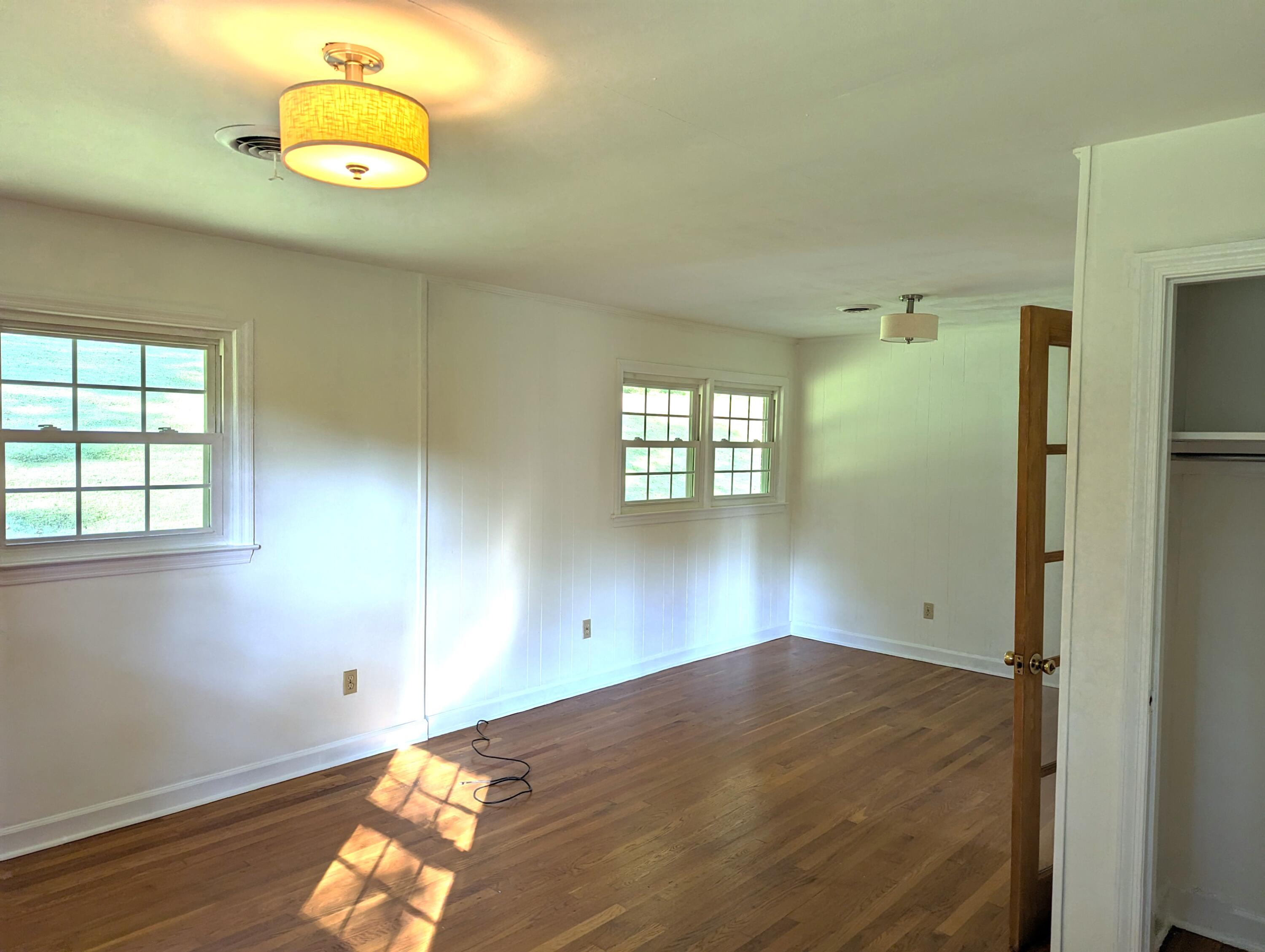 1769 Factory Hill Road Callaway, VA 24067 - Photo 14 of 53 a view of empty room with wooden floor