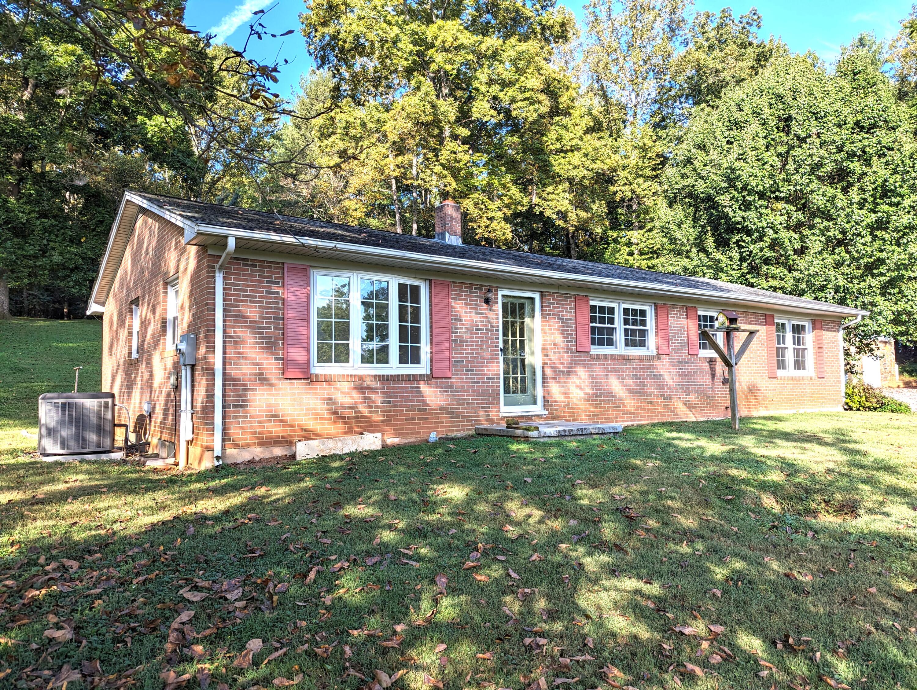 1769 Factory Hill Road Callaway, VA 24067 - Photo 2 of 53 a view of a house with a backyard
