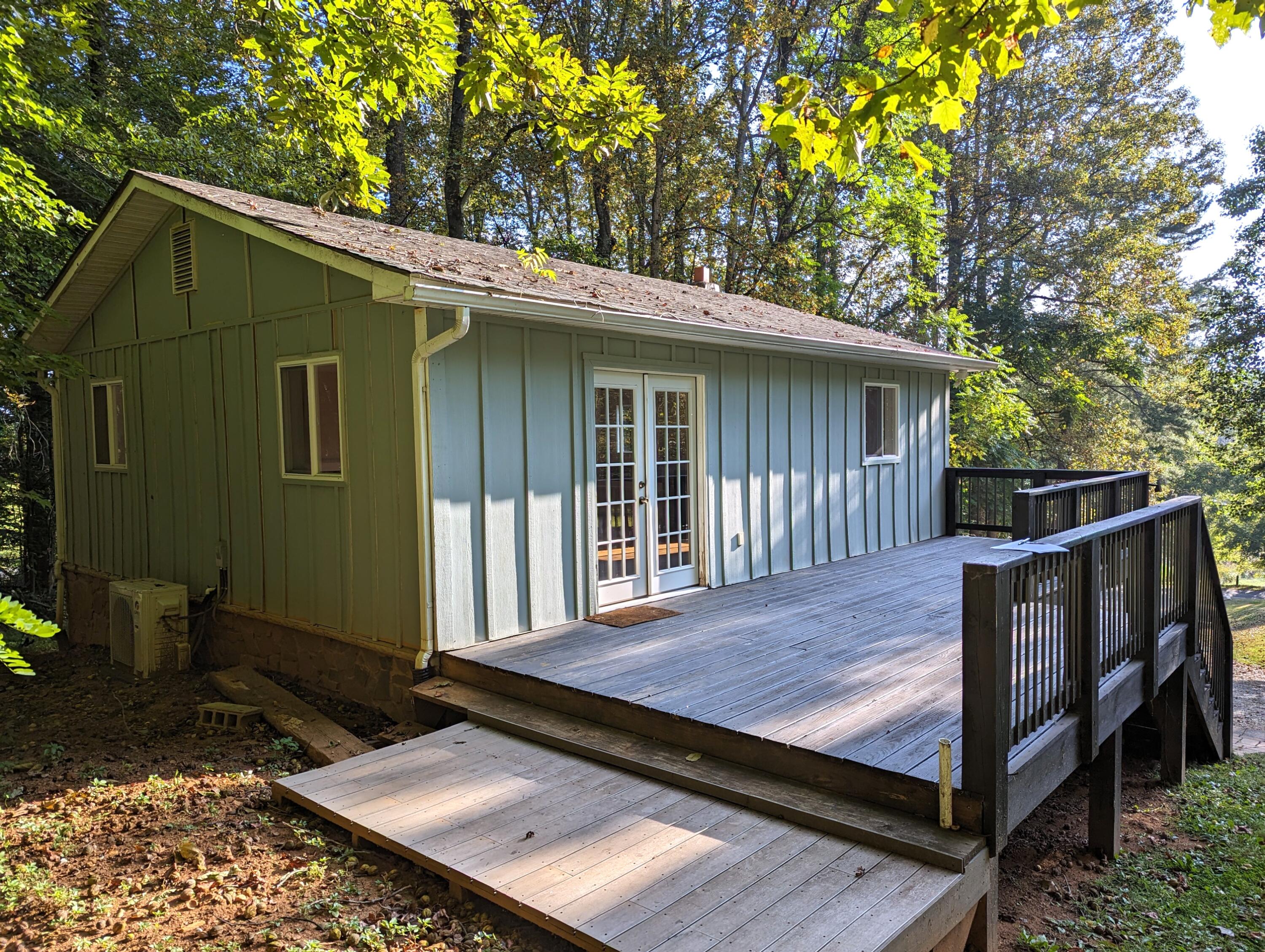 1769 Factory Hill Road Callaway, VA 24067 - Photo 23 of 53 a view of backyard with deck and outdoor seating