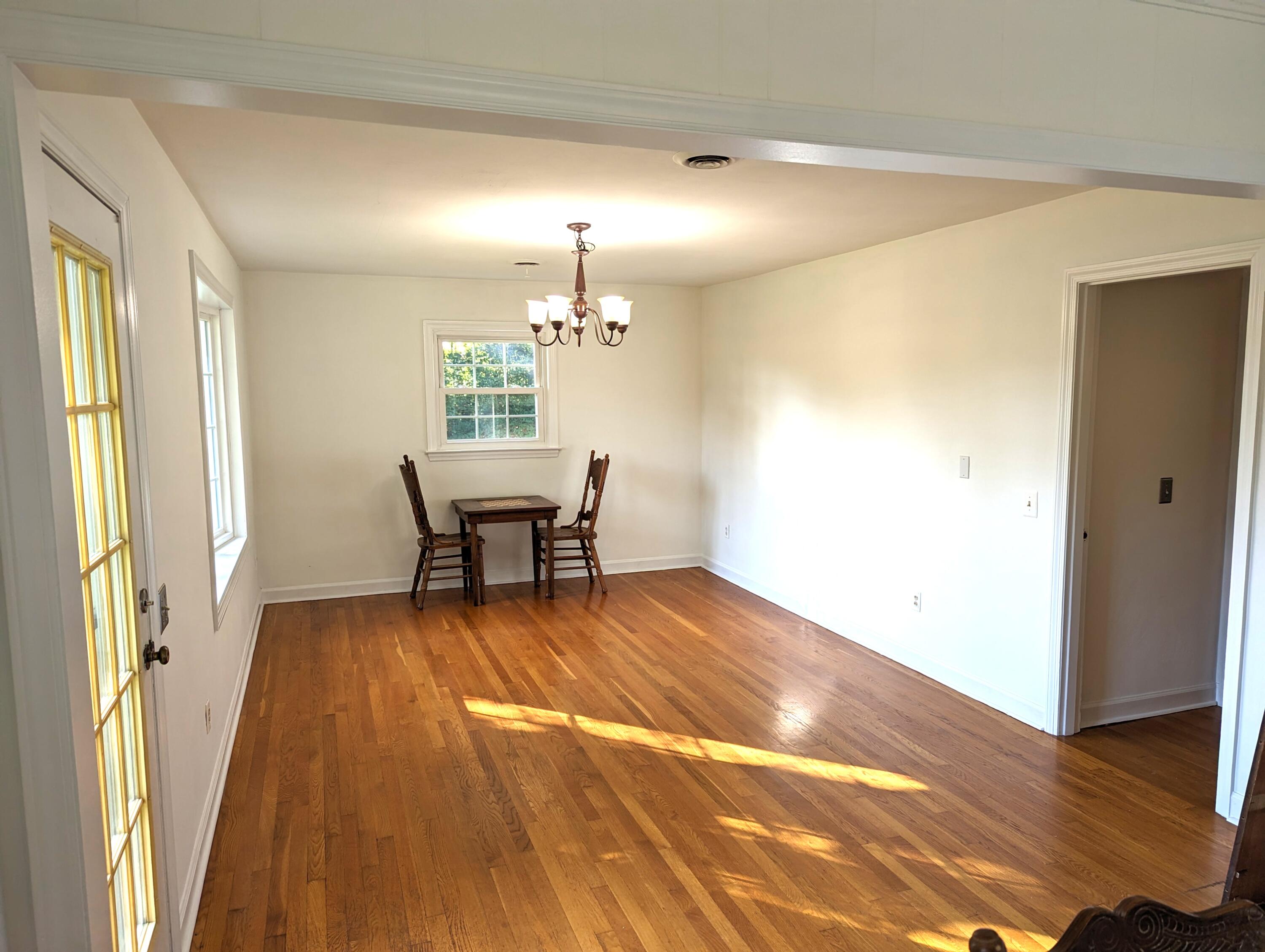 1769 Factory Hill Road Callaway, VA 24067 - Photo 9 of 53 a view of a livingroom with furniture wooden floor and a window
