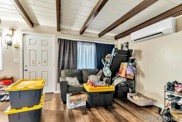 a room with furniture and gym equipment