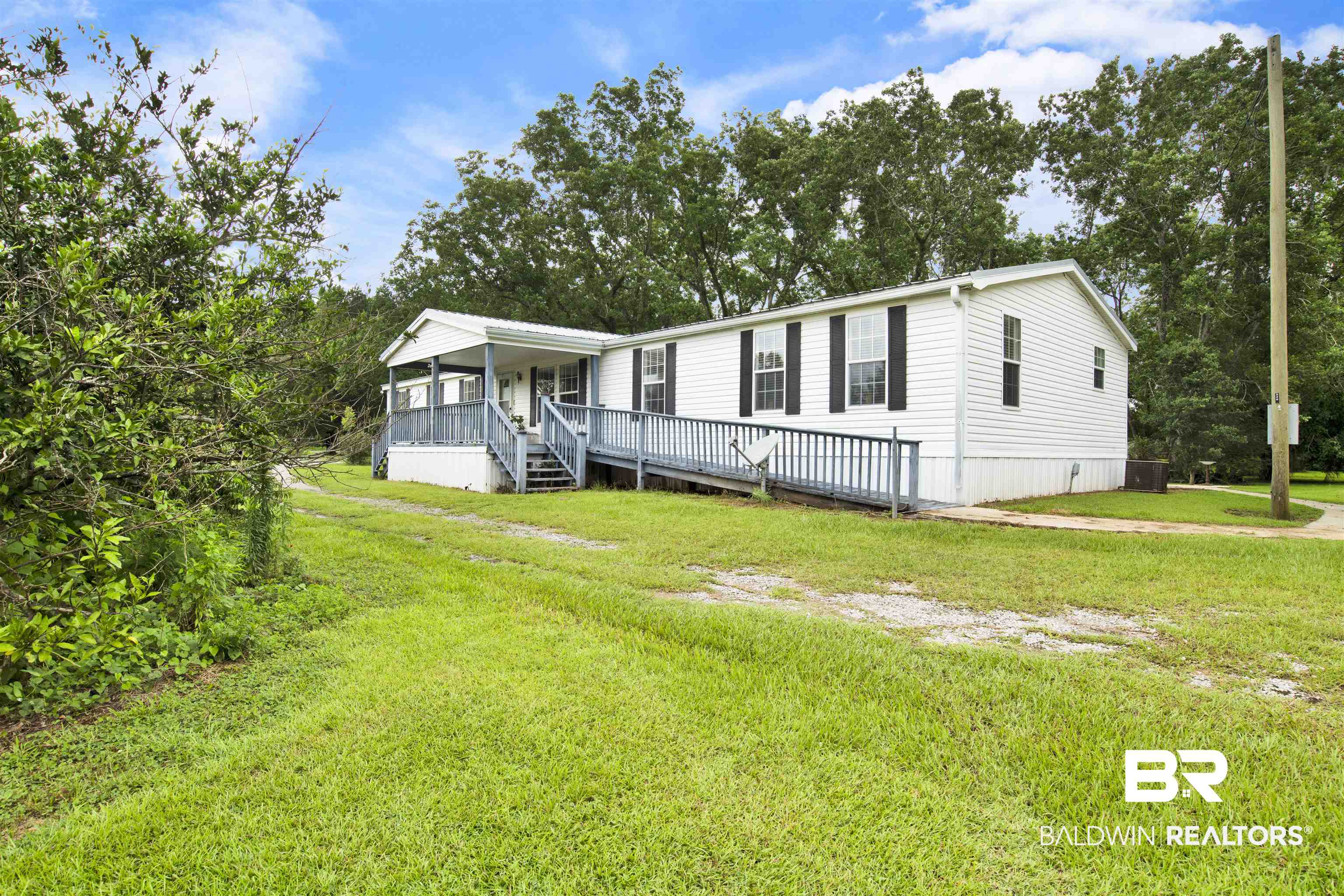 25700 County Road 71 Robertsdale, AL 36567 - Photo 26 of 40 Manufactured / mobile home with a front lawn