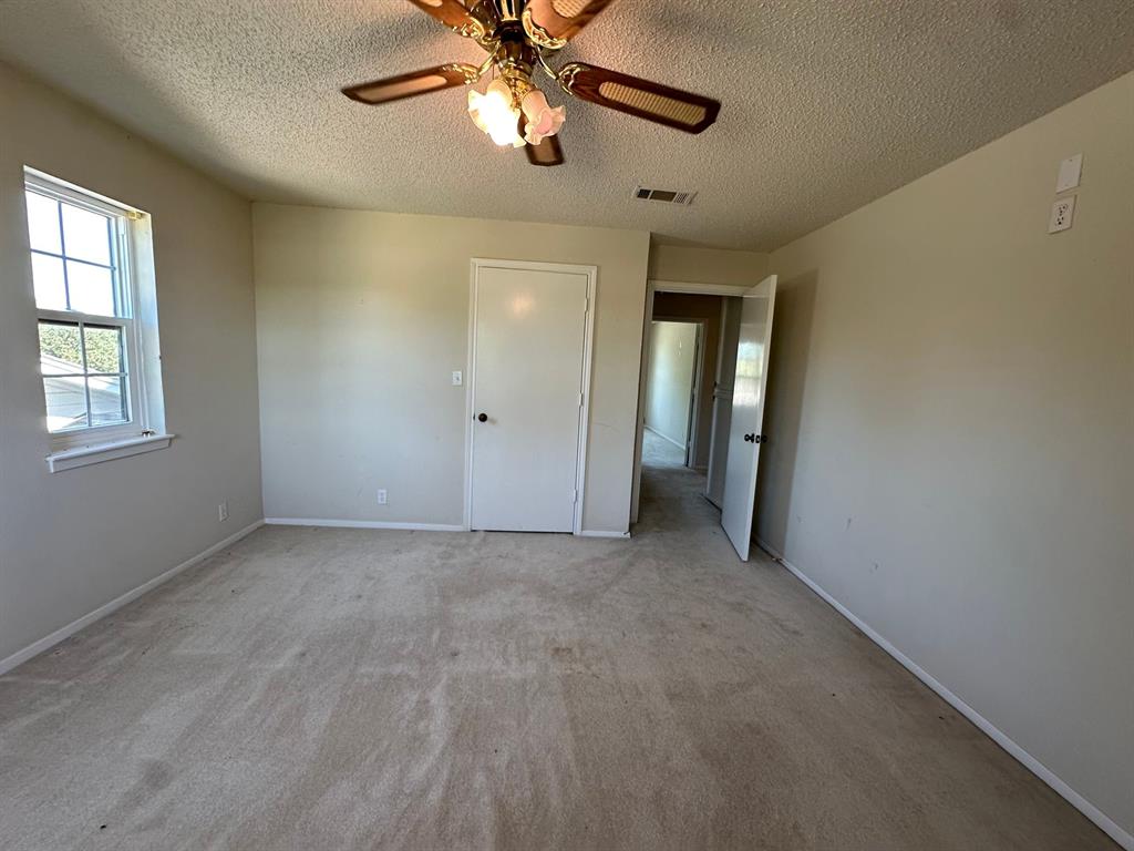 11552 Massey Road Pilot Point, TX 76258 - Photo 22 of 38 a view of an empty room with a window