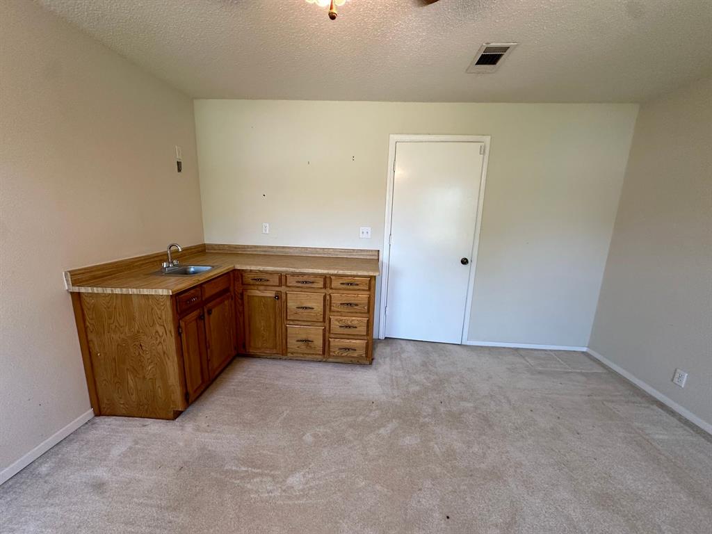 11552 Massey Road Pilot Point, TX 76258 - Photo 27 of 38 an empty room with an empty space