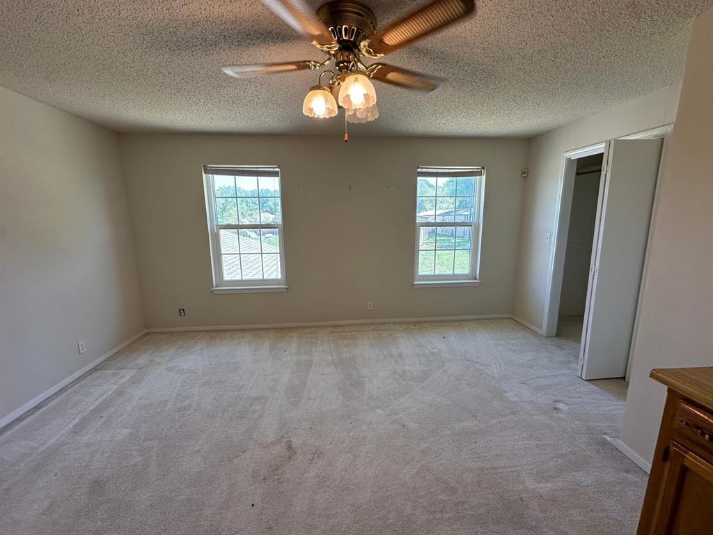 11552 Massey Road Pilot Point, TX 76258 - Photo 28 of 38 a view of an empty room with a window