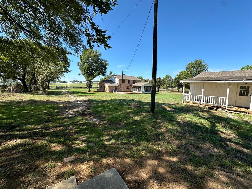 11552 Massey Road Pilot Point, TX 76258 - Photo 30 of 38 a view of a house with a yard