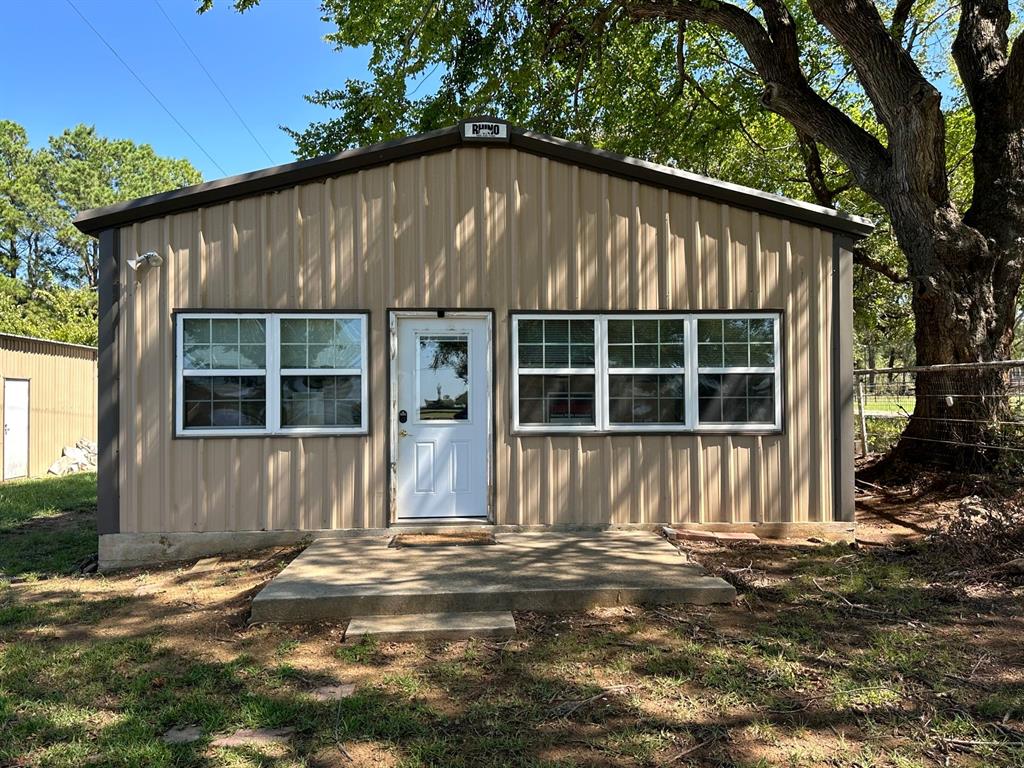 11552 Massey Road Pilot Point, TX 76258 - Photo 6 of 38 a front view of a house