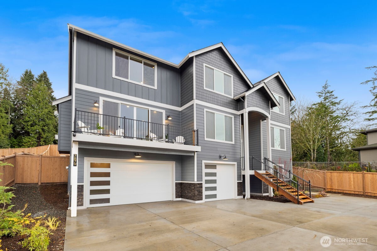 7879 South 132nd Street Seattle, WA 98178 - Photo 2 of 37 a view of a house with a outdoor space