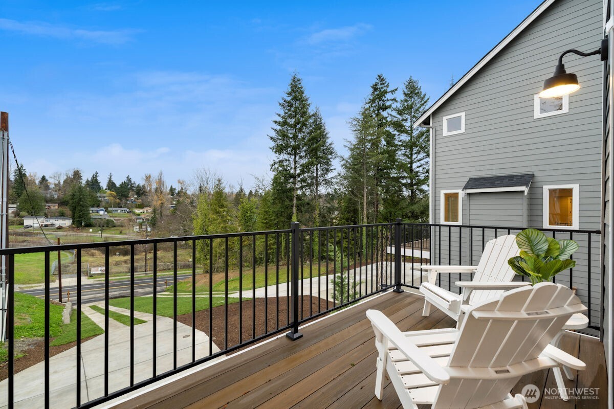 7879 South 132nd Street Seattle, WA 98178 - Photo 28 of 37 a view of a balcony with wooden floor and outdoor seating