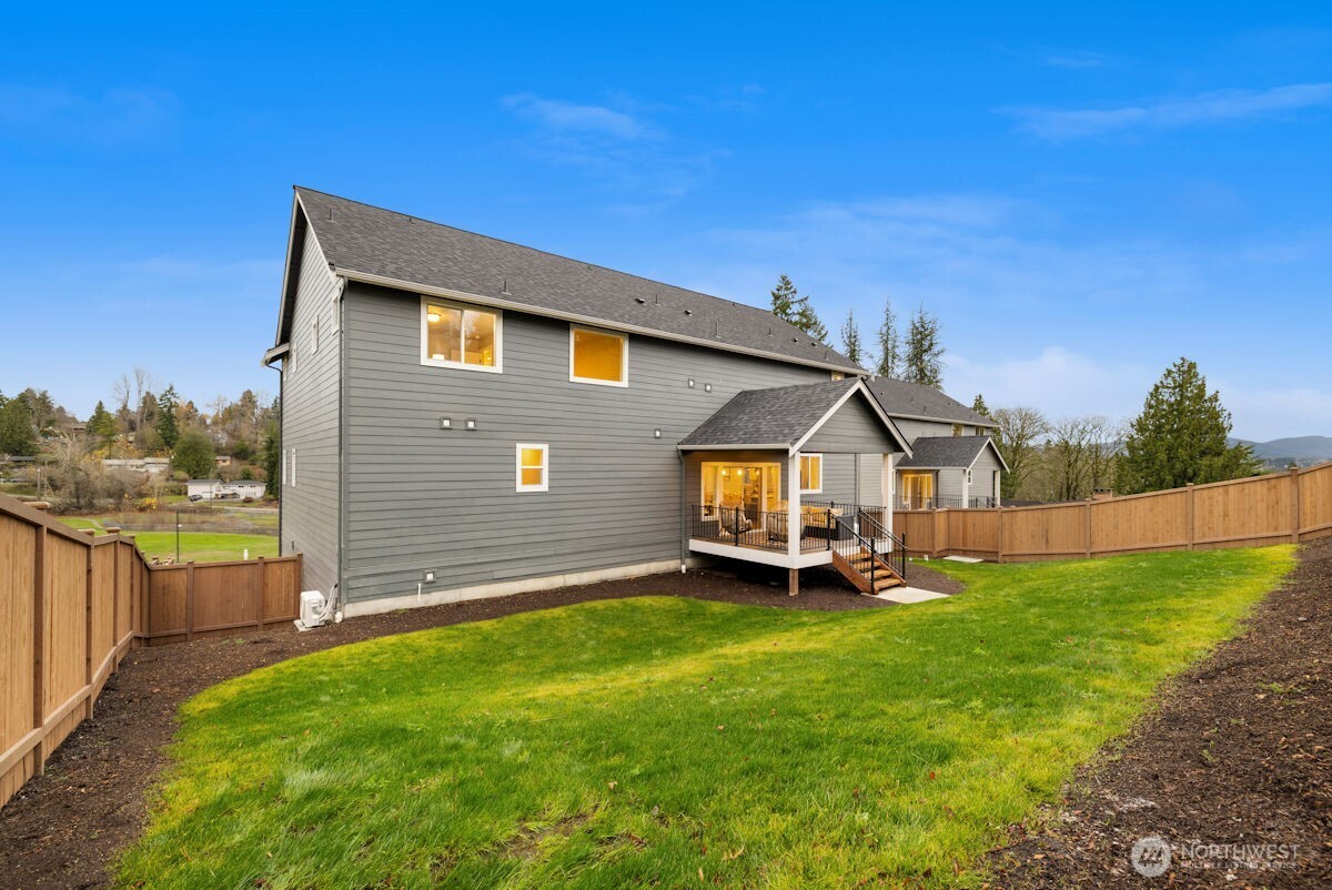 7879 South 132nd Street Seattle, WA 98178 - Photo 32 of 37 a front view of a house with a yard