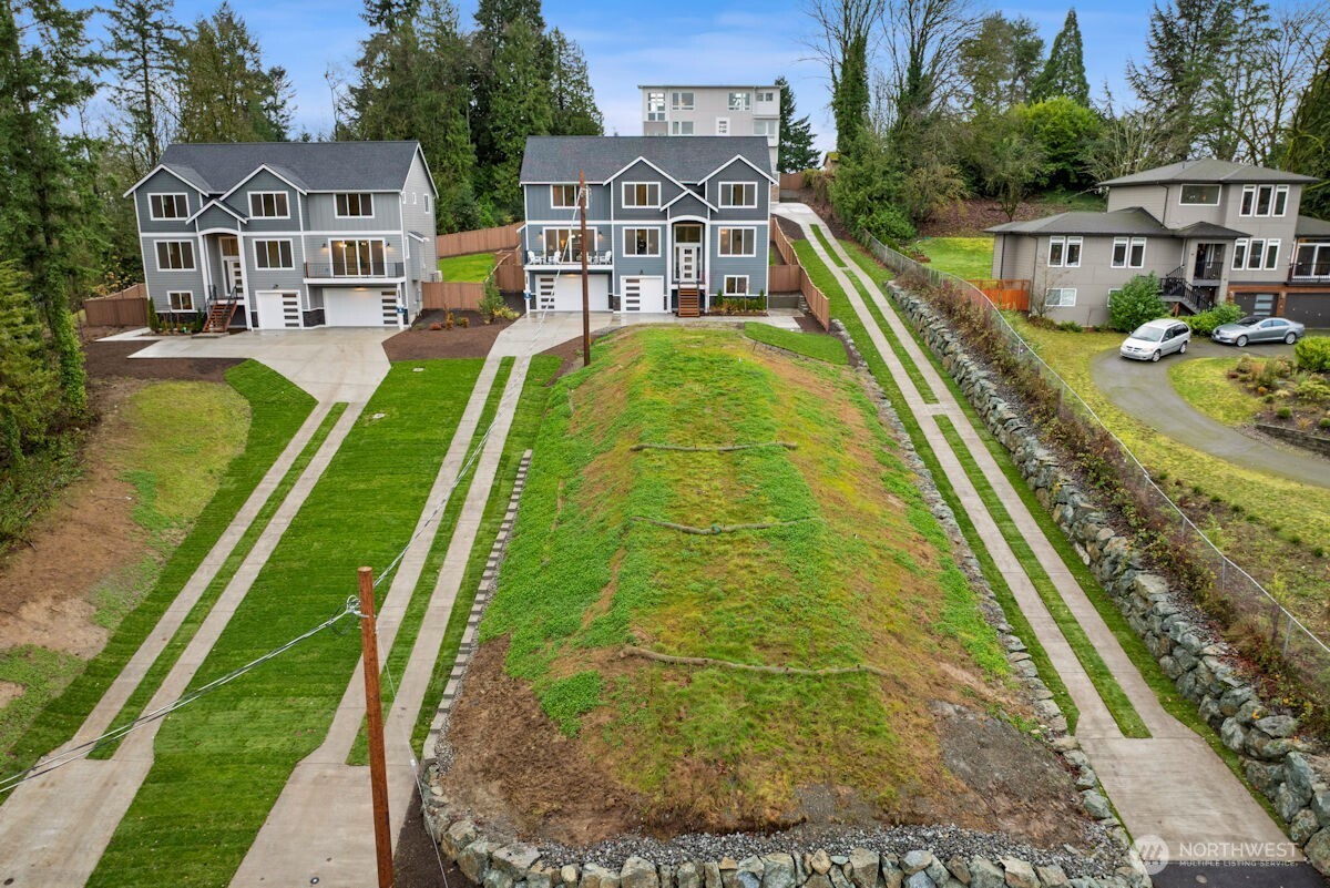 7879 South 132nd Street Seattle, WA 98178 - Photo 35 of 37 a view of a house with a yard
