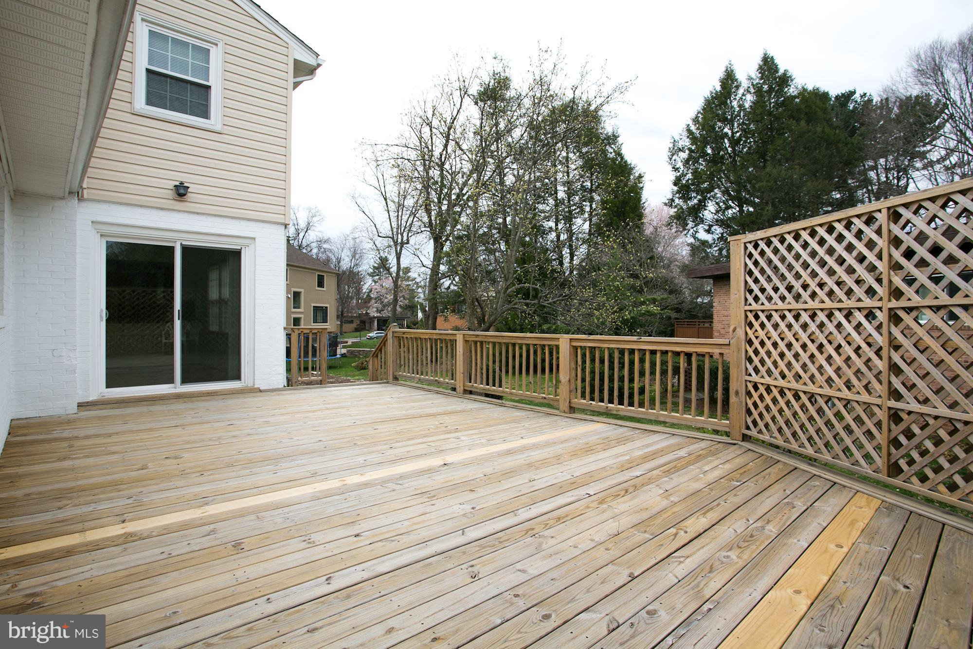 8107 Falstaff Road McLean, VA 22102 - Photo 14 of 29 Deck directly off of family room