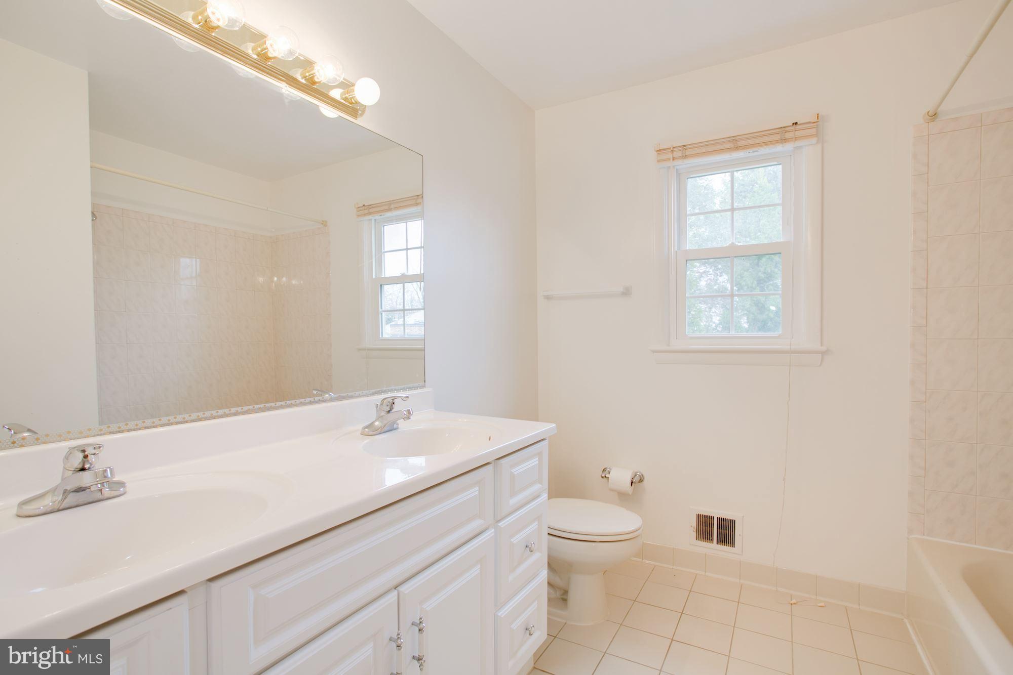 8107 Falstaff Road McLean, VA 22102 - Photo 19 of 29 Hall bath on bedroom level