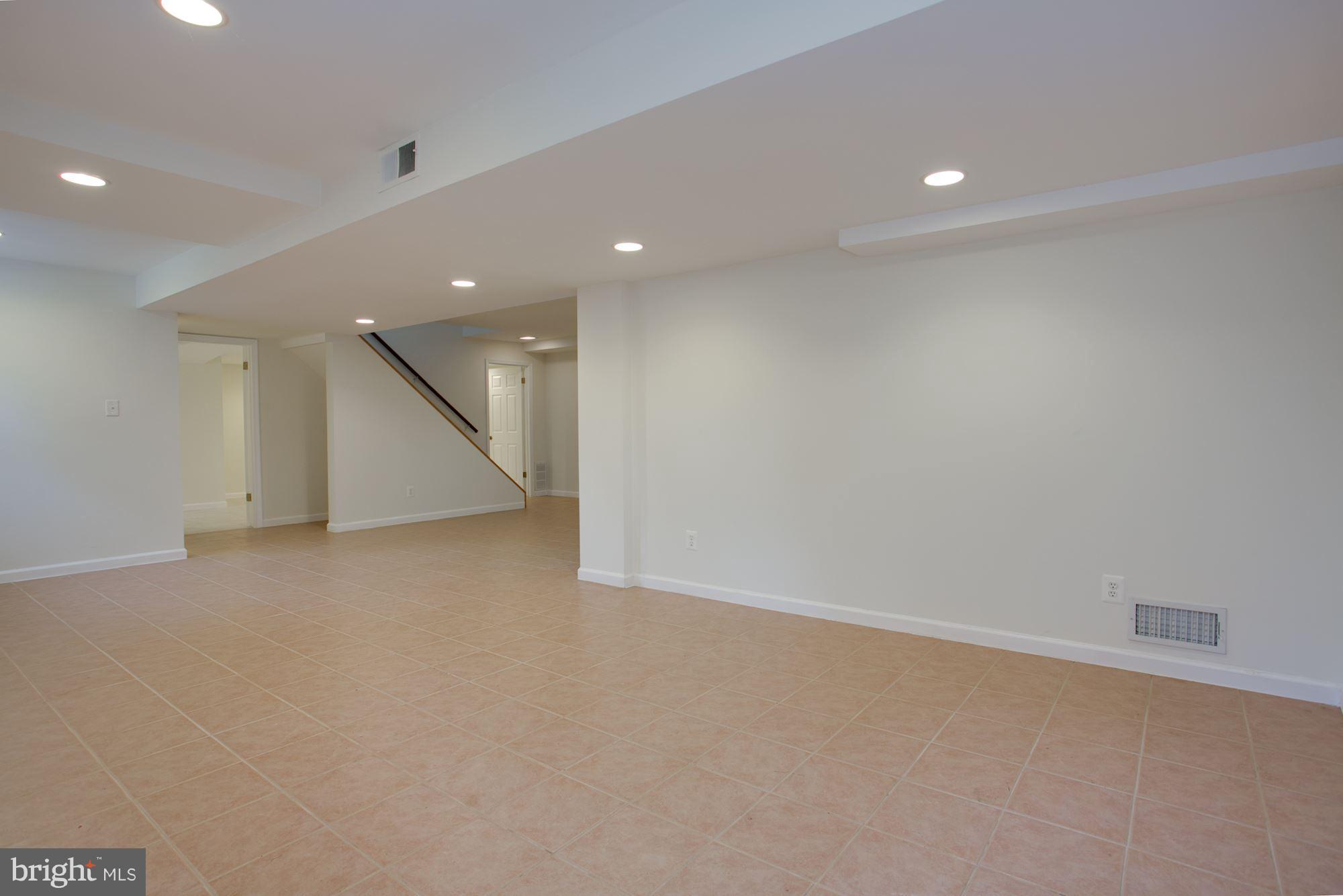 8107 Falstaff Road McLean, VA 22102 - Photo 24 of 29 Lower level recreation room