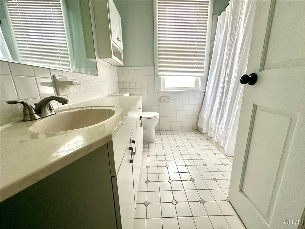 405 Spratt Place Utica, NY 13502 - Photo 8 of 15 First Floor Bath