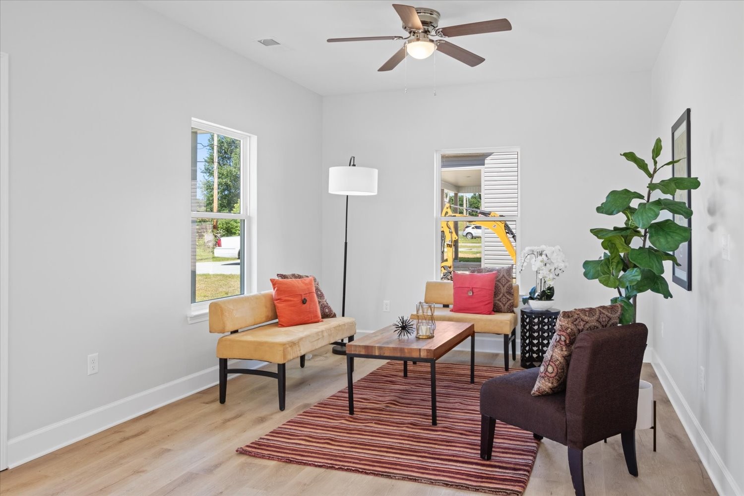 142 Eno Road Dickson, TN 37055 - Photo 3 of 17 a living room with furniture and a potted plant