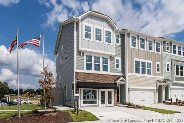 a front view of a building with street view