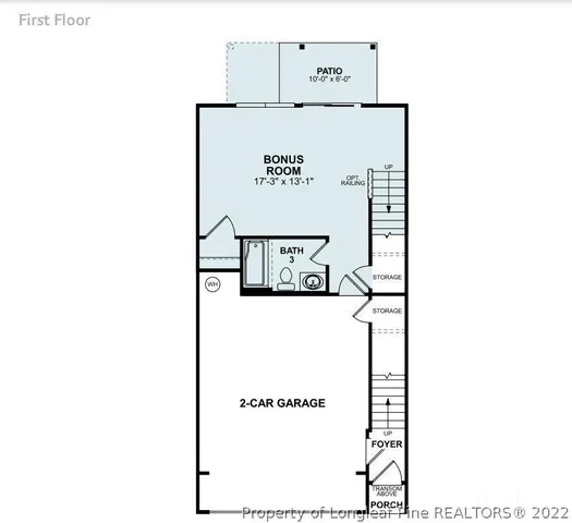 a sign on top of a white wall