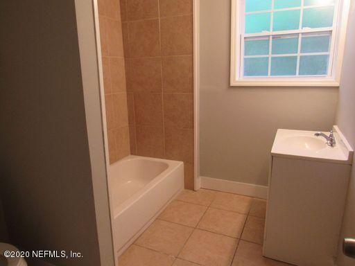 4909 Ave B Jacksonville, FL 32209 - Photo 11 of 17 a bathroom with a bathtub