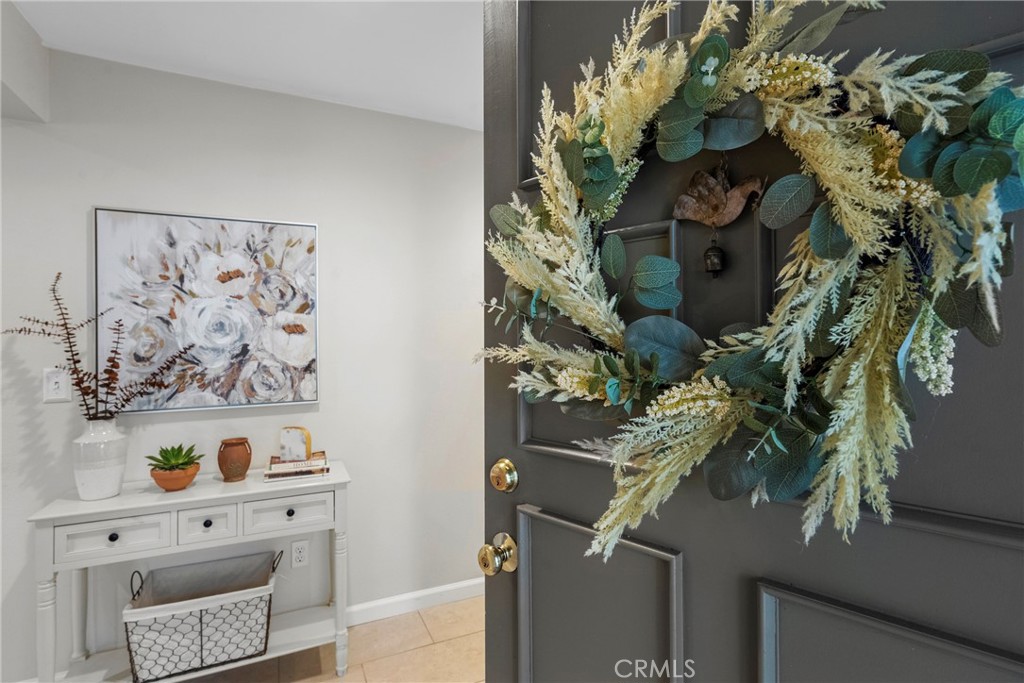 2172 Biscayne Costa Mesa, CA 92627 - Photo 8 of 18 a vase of flowers sitting on a table