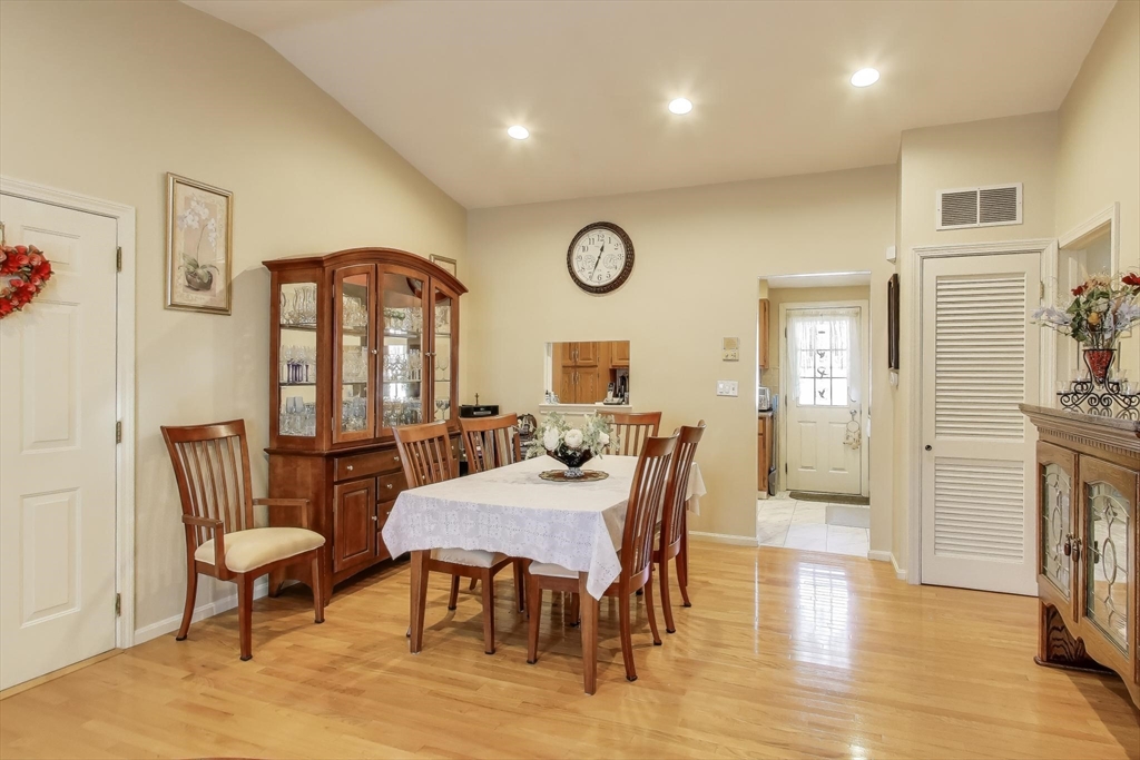 425 Main Street, Unit 11B Hudson, MA 01749 - Photo 8 of 26 a view of a dining room with furniture
