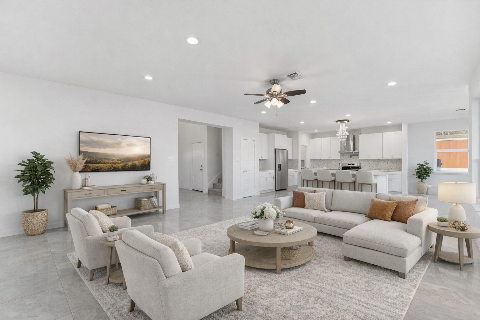 18611 Ratho Drive Conroe, TX 77306 - Photo 10 of 28 a living room with furniture and a flat screen tv