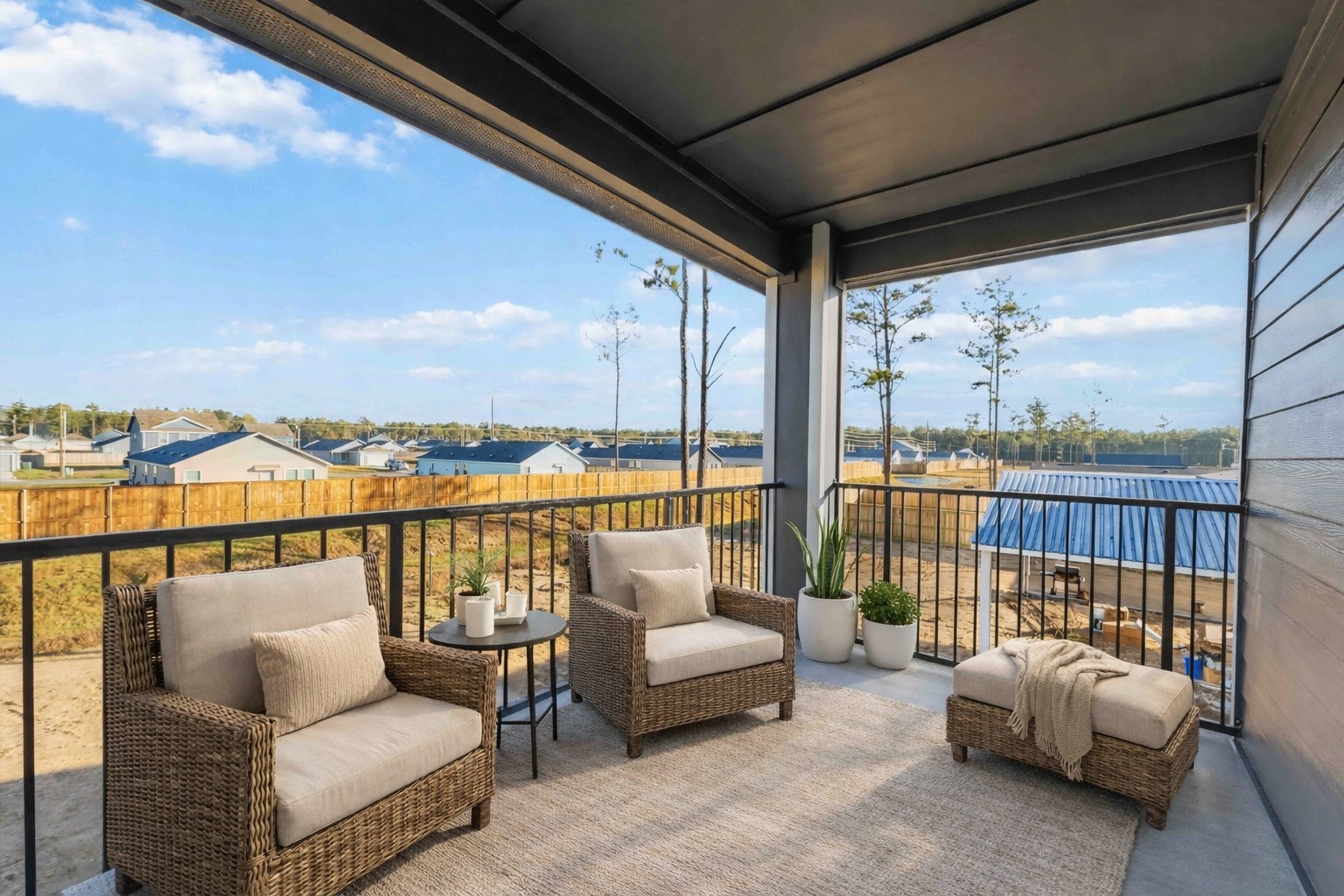 18611 Ratho Drive Conroe, TX 77306 - Photo 14 of 28 a balcony with furniture and city view