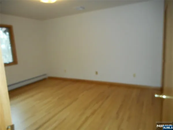 a view of a room with a window