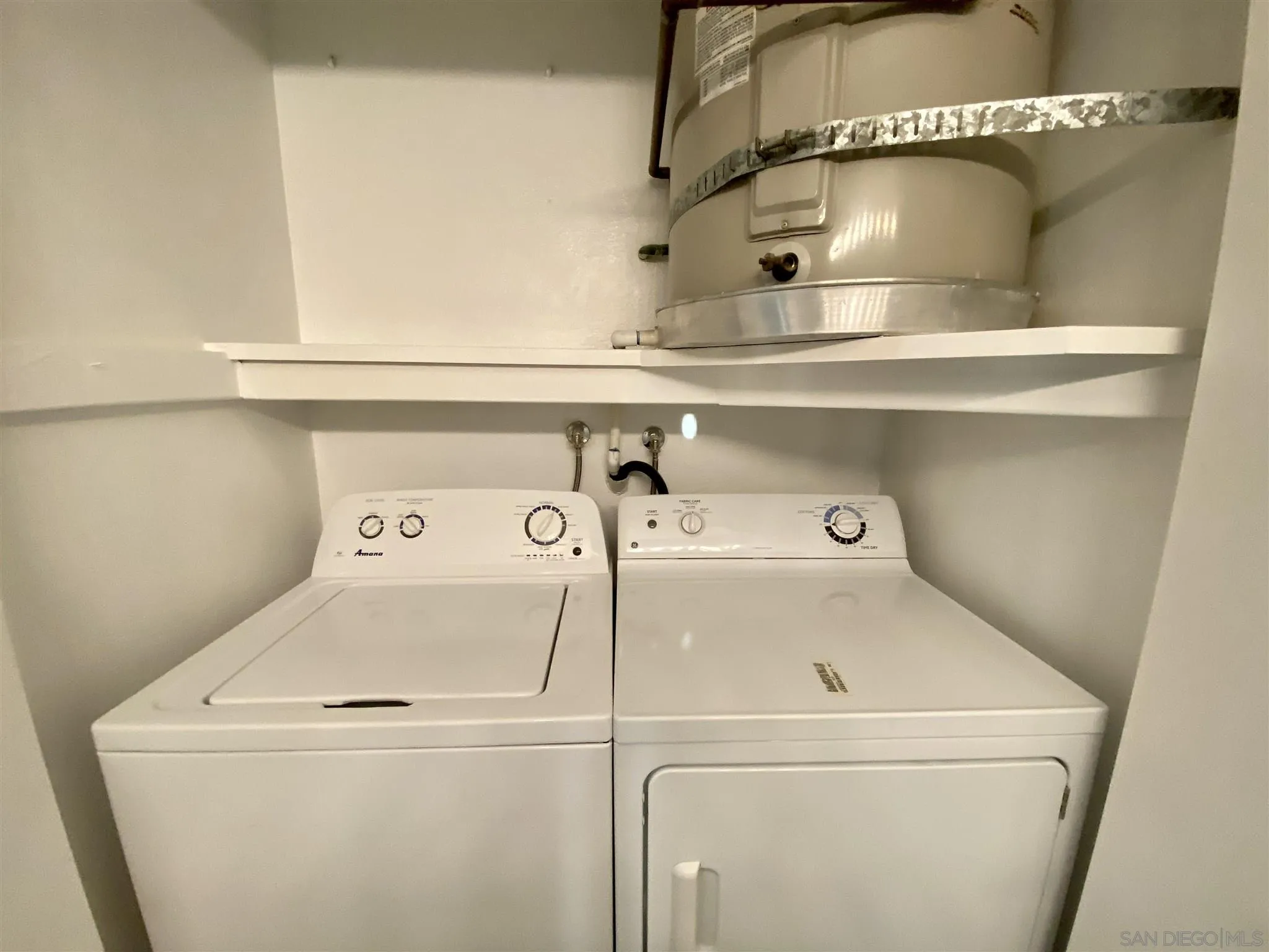 17161 Alva Road, Unit 213 San Diego, CA 92127 - Photo 12 of 48 a utility room with dryer and washer