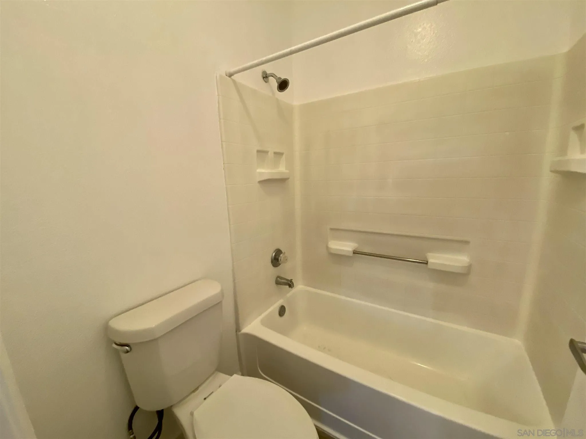 17161 Alva Road, Unit 213 San Diego, CA 92127 - Photo 18 of 48 a bathroom with a toilet and a bathtub
